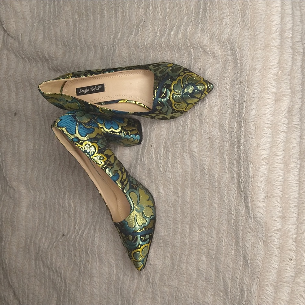 Women's UK size 39 (us 8) heals.